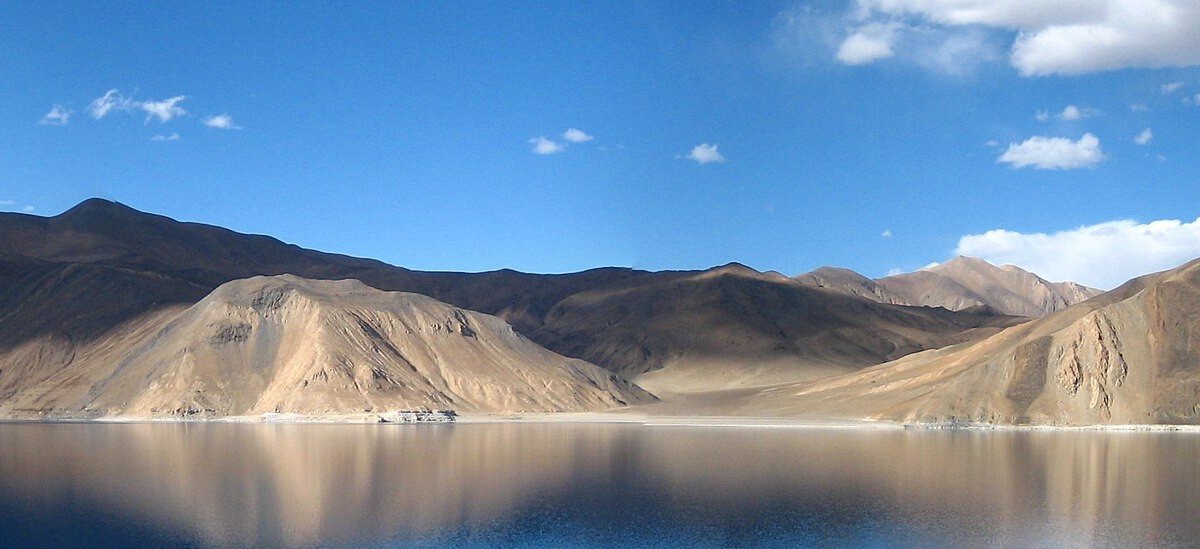 A panoramic view of Pangong Tso lake of Ladakh.  This image has been cropped from the original for use in a Wikivoyage Pagebanner template.