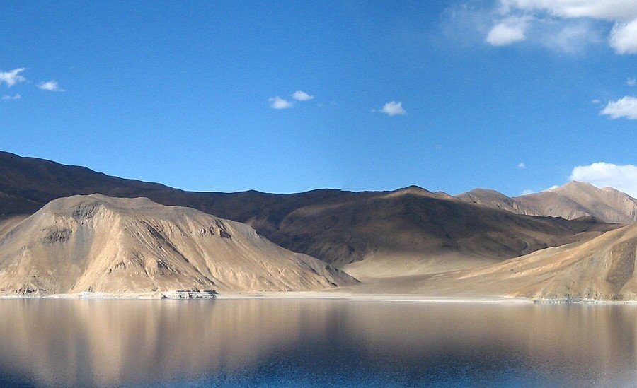 A panoramic view of Pangong Tso lake of Ladakh.  This image has been cropped from the original for use in a Wikivoyage Pagebanner template.